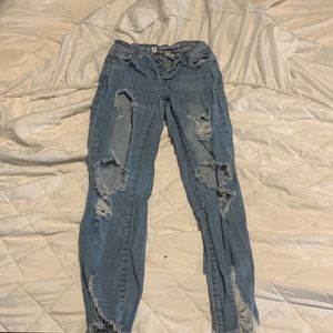 S.O.N.G woman’s ripped skinny jeans